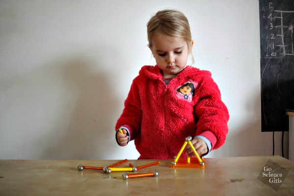 Almost 3 year old playing with Geomag colour toy