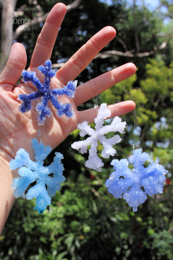 Four crystal snowflakes in the sunshine